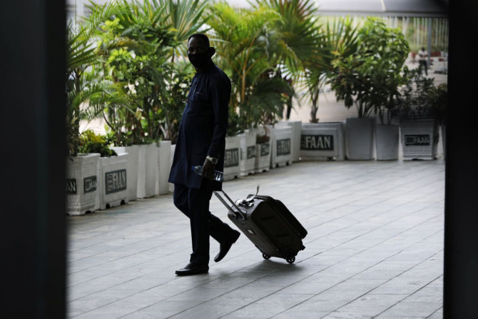 A man is seen on arrival at the domestic wing of the Nnamdi Azikiwe International Airport on its re-opening day for domestic flight operations, in Abuja