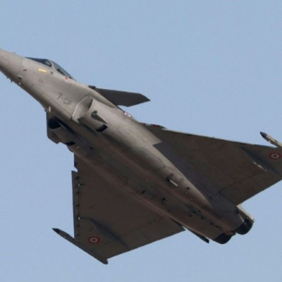A French air force (Armee de l'air) Dassault Rafale multirole fighter aircraft performs aerial manuevers during the 2021 Dubai Airshow in the Gulf emirate on November 14, 2021