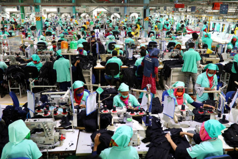 Employees work at a garments factory in Bangladesh
