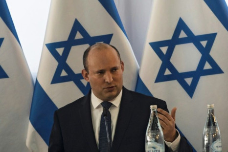Israeli Prime Minister Naftali Bennett heads the weekly cabinet meeting in Kibbutz Mevo Hama in the Israeli-annexed Golan Heights