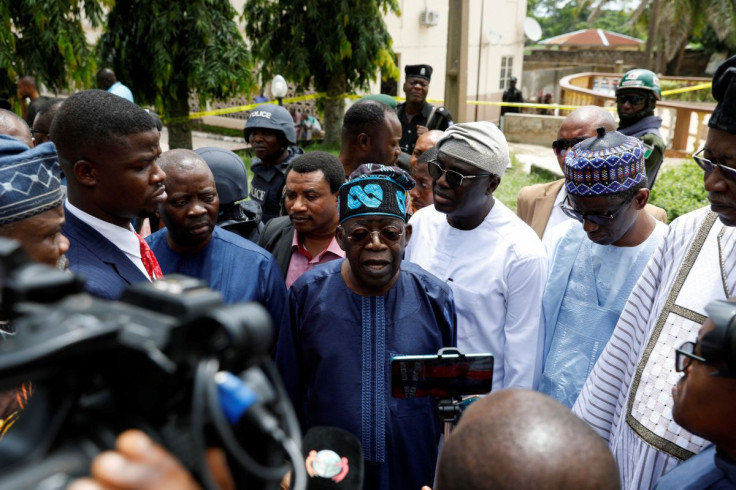 All Progressives Congress National Leader and Presidential aspirant Bola Tinubu visits to St. Francis Catholic Church, following an attack by gunmen on worshippers during a Sunday mass service, in Owo